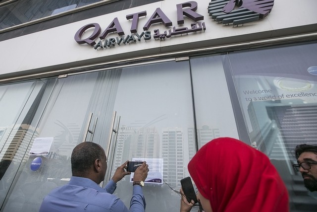 Оаэ закрывают счета россиянам. Катар офис. Номера представительства Катар.
